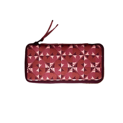 Patterned wallet with a strap on a white background