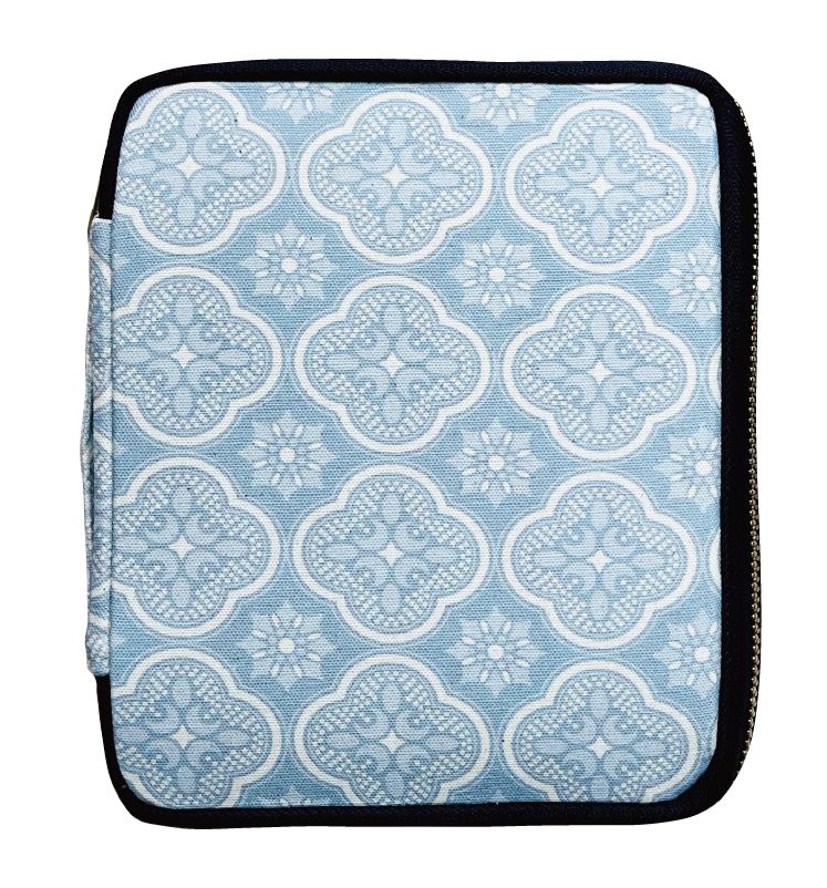 The Kyoku Haku Begonia Flowers 10 Pen Case by Piper Trading Co. is a handmade zippered fabric pouch featuring a light blue and white geometric pattern with symmetrical floral and circular motifs, beautifully photographed on a white background. Perfect for use as a fountain pen case or to hold up to ten pens, it combines style and practicality for your writing essentials.