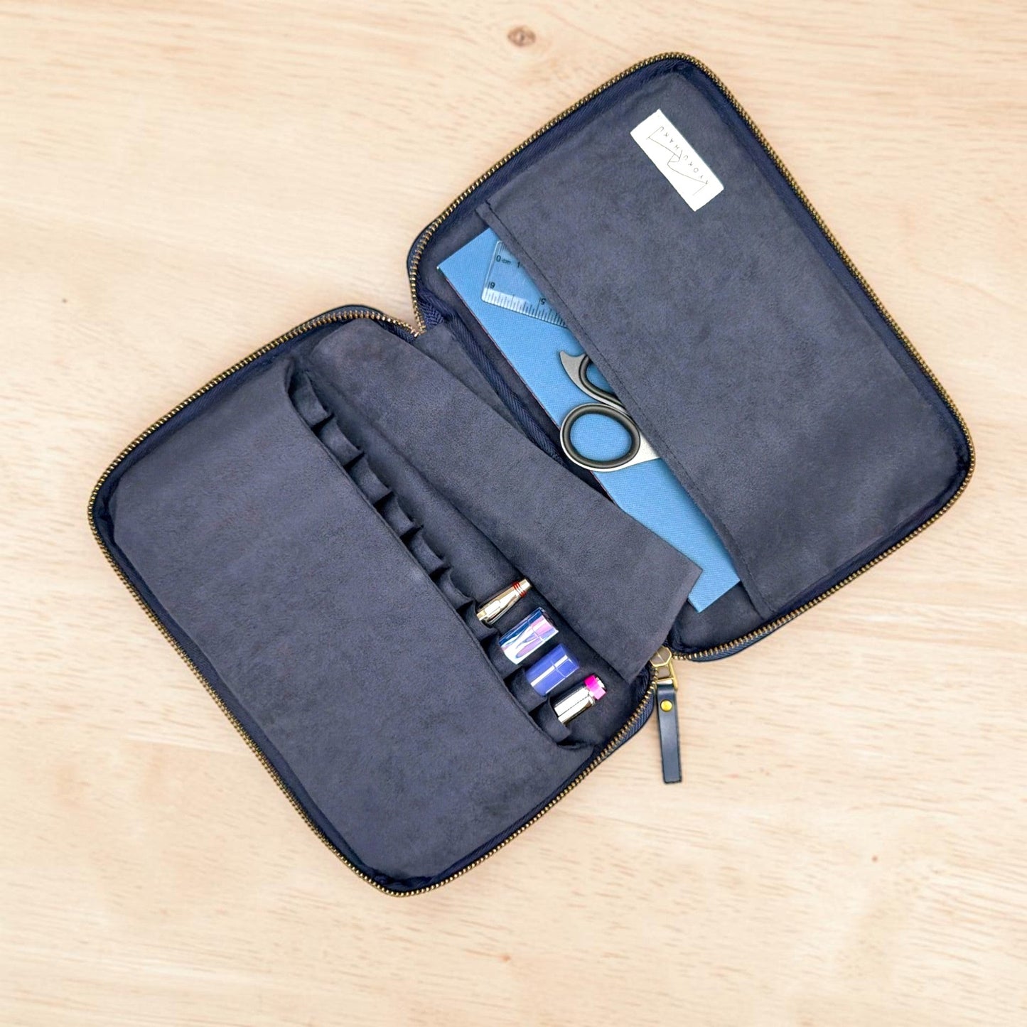 Piper Trading Co. Kyoku Haku 10 pen case in navy blue suede with internal storage pockets and zipper closure