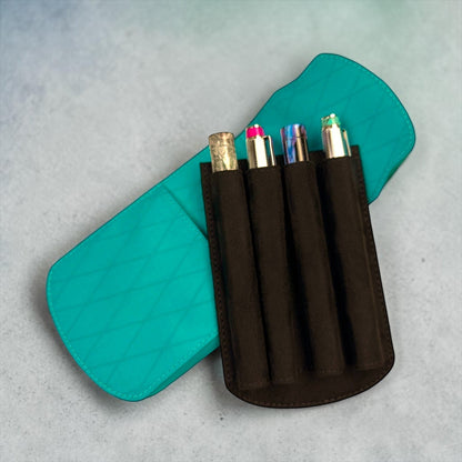 Piper Trading Co. teal X-Pac four-pen case with black interior slots holding four pens.