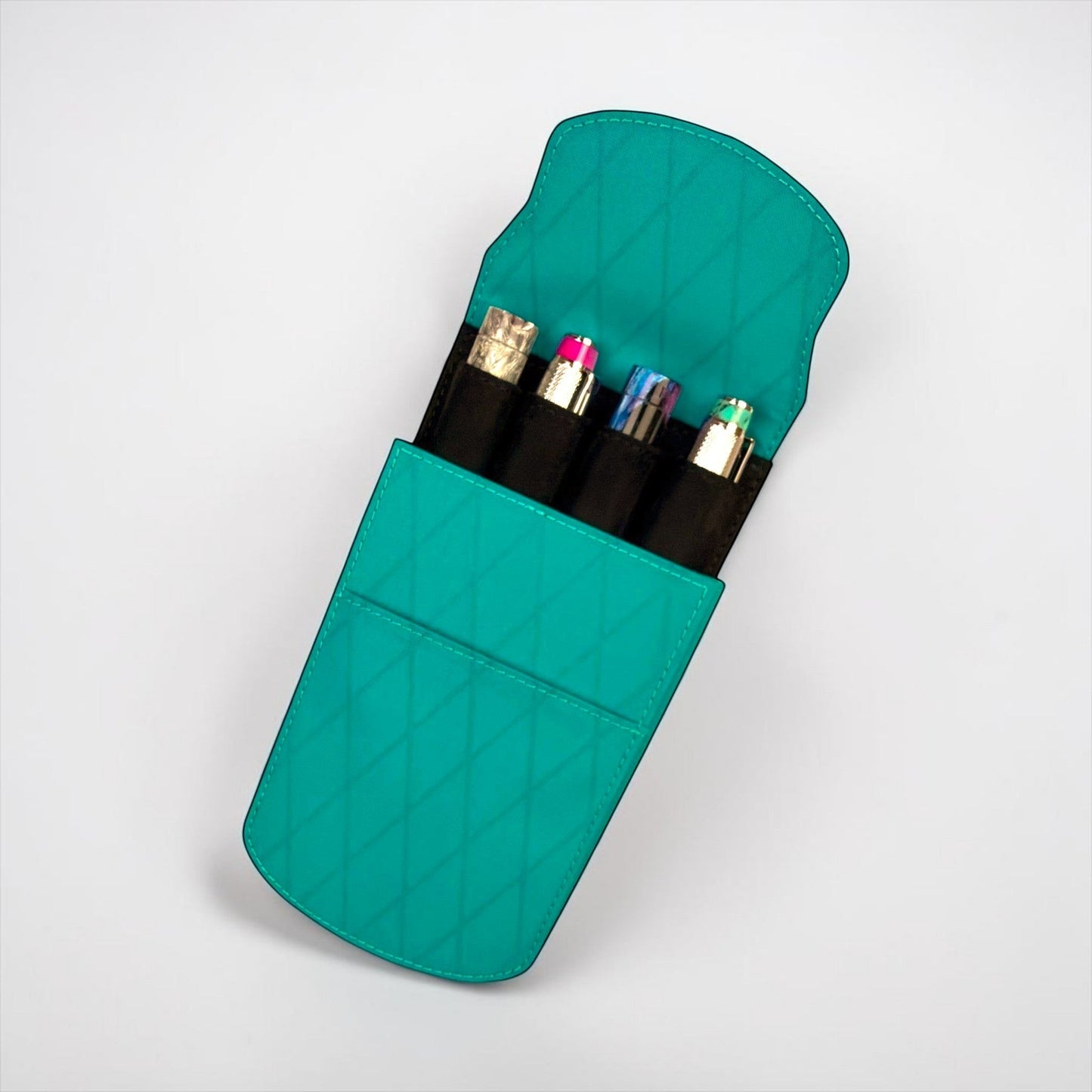 Teal X-Pac material four-pen case by Piper Trading Co. with fold-over flap closure and diamond stitching.